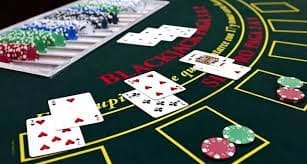 Roulette table with dealer preparing to spin and betting closed notification
